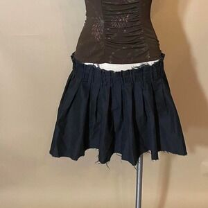 Black pleated mini skirt with frayed hem